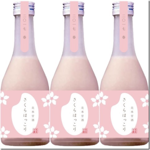 ピンク色のラベルで造られた3本の甘酒の写真